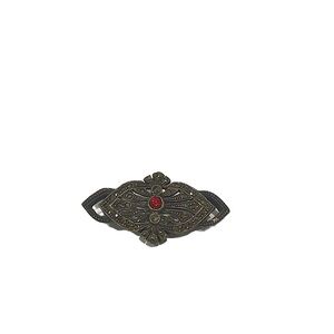 Vintage art deco style pin with garnet colored stone. GUC